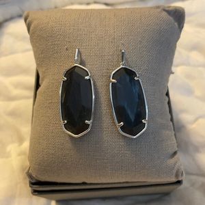 Kendra Scott earrings.